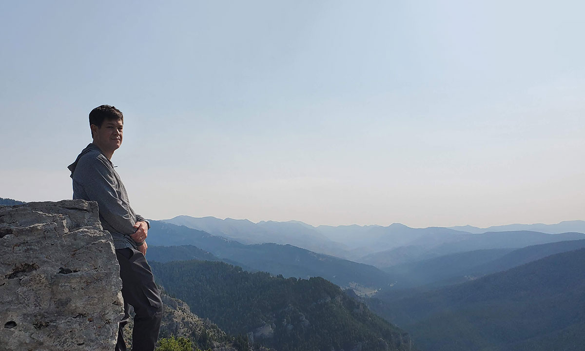 Jeff Glazer on mountain summit.