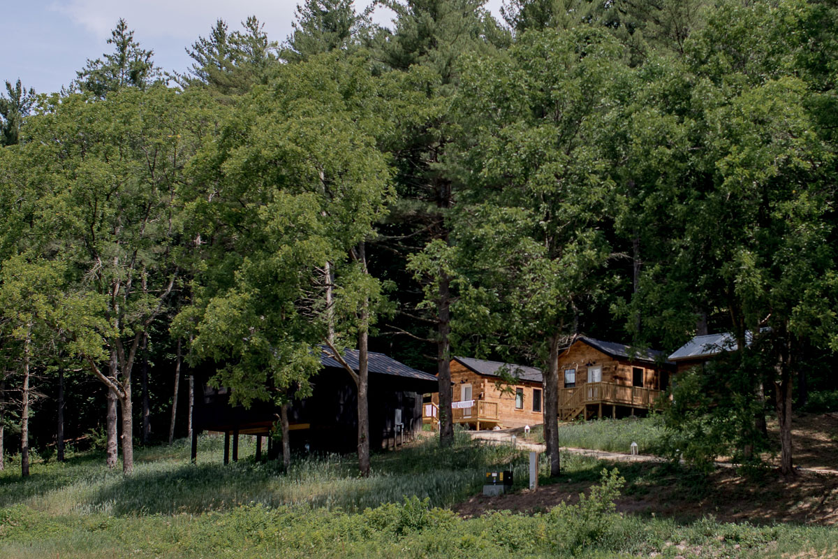 image of cabins in the woods