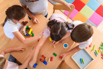 Children playing at a table