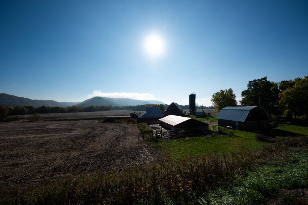 The sun shines on a farm in rural Wisconsin. The sun shines on a farm in rural Wisconsin.